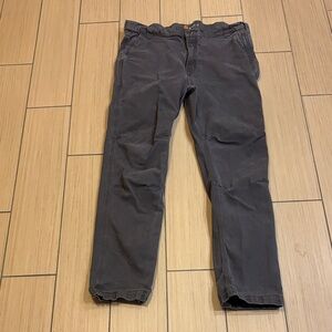 Carhartt Straight Fit pants in gray or stone gray.